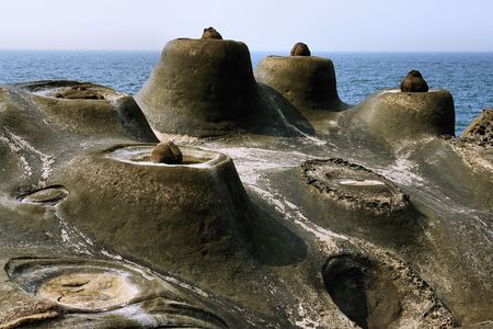 Interesting rock formations close to the seaの写真素材
