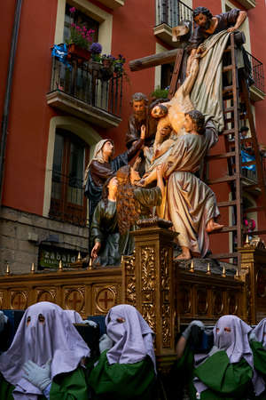 PAMPLONA, NAVARRA SPAIN APRIL 19 2019: HOLY WEEK PROCESSION THROUGH THE STREETS OF PAMPLONA