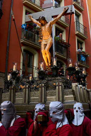 PAMPLONA, NAVARRA SPAIN APRIL 19 2019: HOLY WEEK PROCESSION THROUGH THE STREETS OF PAMPLONA
