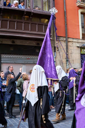 PAMPLONA, NAVARRA SPAIN APRIL 19 2019: HOLY WEEK PROCESSION THROUGH THE STREETS OF PAMPLONA