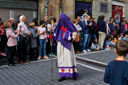 PAMPLONA, NAVARRA SPAIN APRIL 19 2019: HOLY WEEK PROCESSION THROUGH THE STREETS OF PAMPLONA