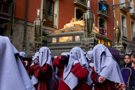 PAMPLONA, NAVARRA SPAIN APRIL 19 2019: HOLY WEEK PROCESSION THROUGH THE STREETS OF PAMPLONA