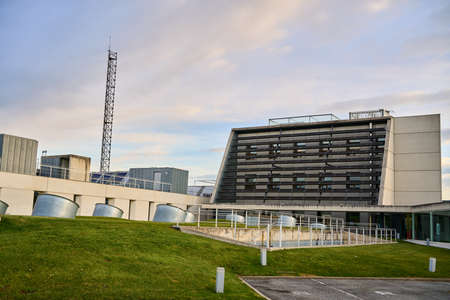 PAMPLONA, NAVARRA SPAIN 23 APRIL 2021RENEWABLES ENERGY CENER building with a grassy field