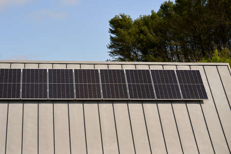 State-of-the-art solar panels placed on the roofs of houses of ecological construction