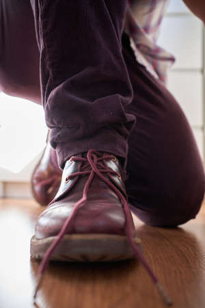 Front view of an elegant shoe with the knot unmadeの写真素材