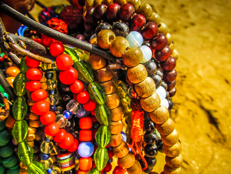 Colorful jewelry sold on the beach in southern Indiaの写真素材