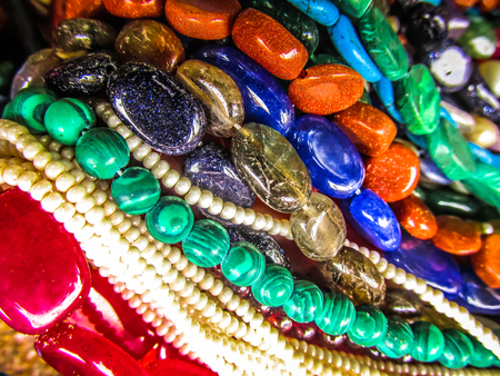 Colorful jewelry sold on the beach in southern Indiaの写真素材