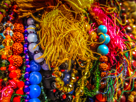 Colorful jewelry sold on the beach in southern Indiaの写真素材