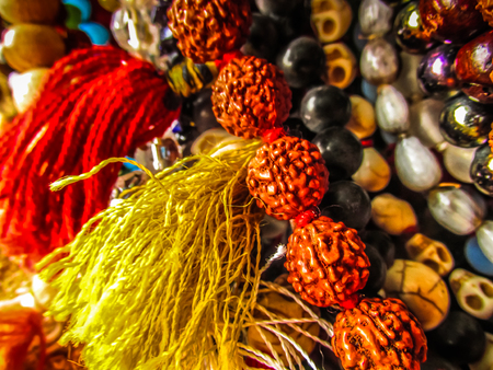 Colorful jewelry sold on the beach in southern Indiaの写真素材