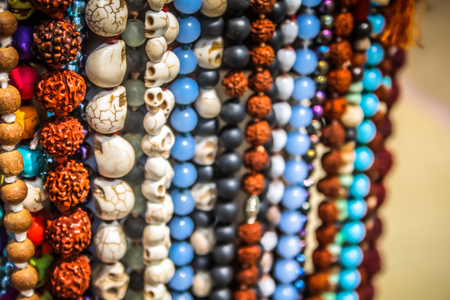 Colorful jewelry sold on the beach in southern Indiaの写真素材