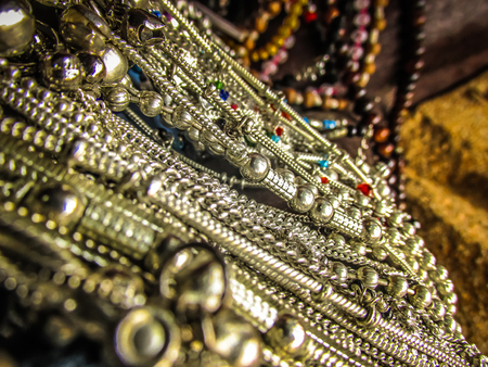 Colorful jewelry sold on the beach in southern Indiaの写真素材