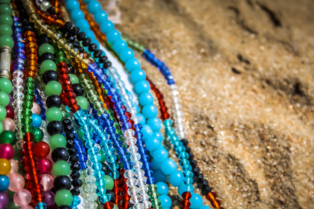 Colorful jewelry sold on the beach in southern Indiaの写真素材