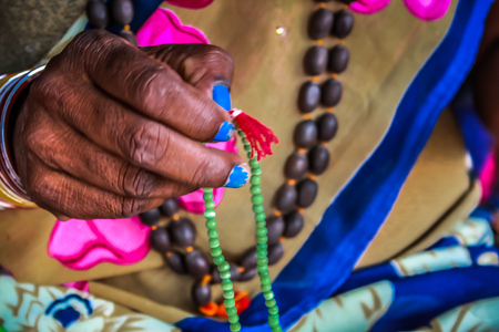 Colorful jewelry sold on the beach in southern Indiaの写真素材