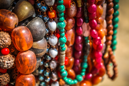 Colorful jewelry sold on the beach in southern Indiaの写真素材
