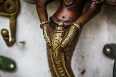 Metal gifts in a tibetan shop in southern Goaの写真素材