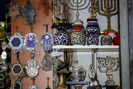Closeup of religious objects in a shop in the bazaar of the old city of Jerusalem