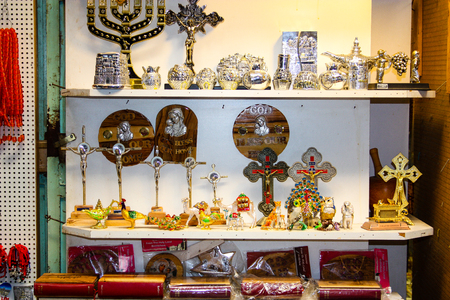 Closeup of religious objects in a shop in the bazaar of the old city of Jerusalemの写真素材