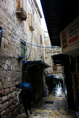 Unknown people walking in the bazaar of the Old City of Jerusalem January 1-2018 on the morningのeditorial素材