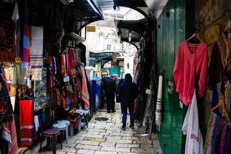 Unknown people walking in the bazaar of the Old City of Jerusalem January 1-2018 on the morningのeditorial素材