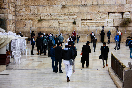 Unknowns people praying on the Western wall in Jerusalem Israel December 31-2017