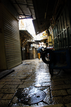 Unknown people walking in the bazaar of the Old City of Jerusalem January 1-2018 on the morningのeditorial素材