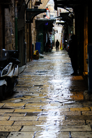 Unknown people walking in the bazaar of the Old City of Jerusalem January 1-2018 on the morningのeditorial素材