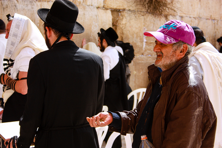 Unknown people praying on the wall of Jerusalem Israelのeditorial素材
