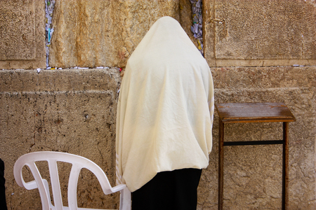 Unknown people praying on the wall of Jerusalem Israelのeditorial素材