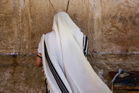 Unknown people praying on the wall of Jerusalem Israelのeditorial素材