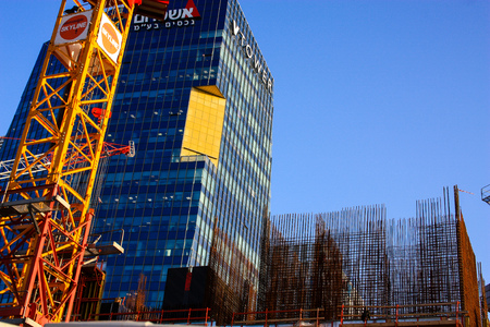 View of a building site of a new building in the city of Tel Aviv in Israel on the eveningのeditorial素材