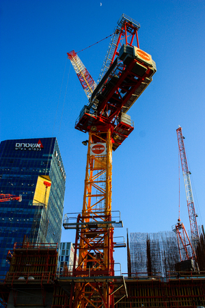 View of a building site of a new building in the city of Tel Aviv in Israel on the eveningのeditorial素材