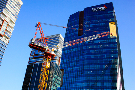 View of a building site of a new building in the city of Tel Aviv in Israel on the eveningのeditorial素材