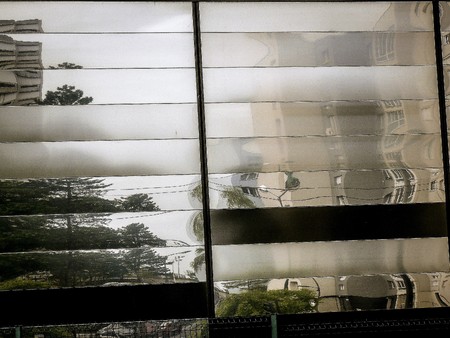 View of buildings in the street of Reims in France on the morningの写真素材