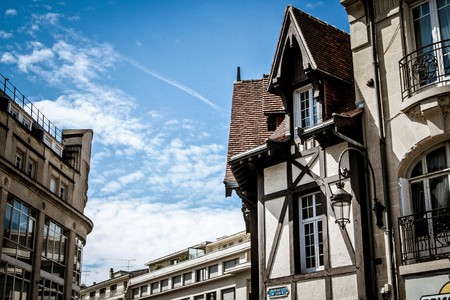 View of buildings in the street of Reims in France on the morningの写真素材