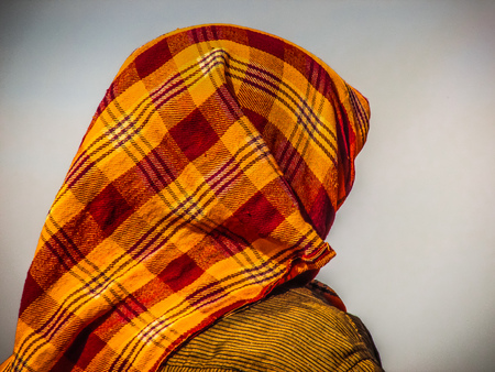 Unknowns women workers carrying stone on the head in Gokarna beach Karnataka India December 03-2017 on the morningのeditorial素材