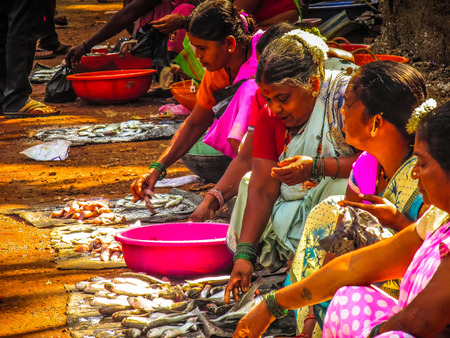 Unknowns people working at the fish market Gokarna Karnataka India December 19, 2017 morningのeditorial素材