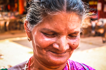 Unknowns people selling flowers on the Ganapati temple Gokarna Karnataka India November 22, 2017 morningのeditorial素材