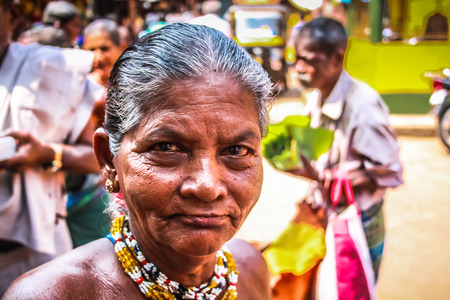 Unknowns people selling flowers on the Ganapati temple Gokarna Karnataka India November 22, 2017 morningのeditorial素材