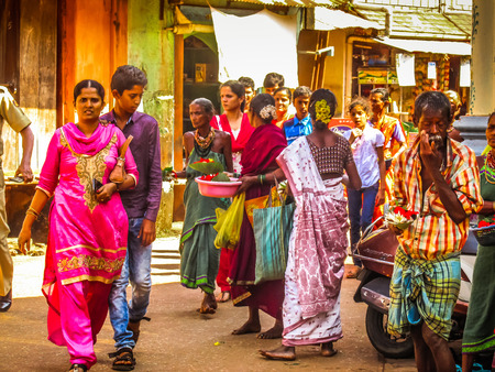 Unknowns people selling flowers on the Ganapati temple Gokarna Karnataka India November 22, 2017 morningのeditorial素材