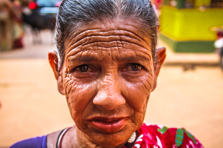 Unknowns people selling flowers on the Ganapati temple Gokarna Karnataka India November 22, 2017 morningのeditorial素材