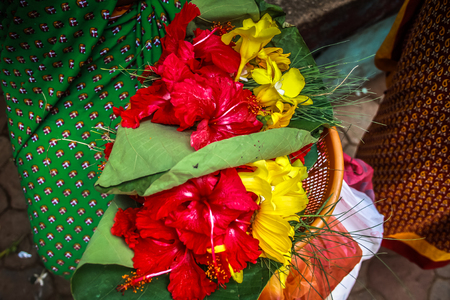 Unknowns people selling flowers on the Ganapati temple Gokarna Karnataka India November 22, 2017 morningのeditorial素材