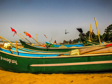 Indian fishing boat on the beach Gokarna Karnataka India December 12, 2017 morningのeditorial素材