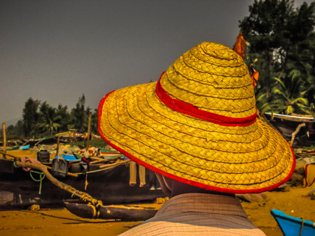 Indian fisher man on the beach Gokarna Karnataka India December 12, 2017 morningのeditorial素材