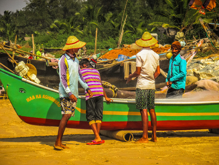 Indian fisher man on the beach Gokarna Karnataka India December 12, 2017 morningのeditorial素材