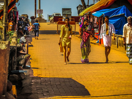 Unknown people walking on the street of Gokarna Karnataka India November 22, 2017 morningのeditorial素材