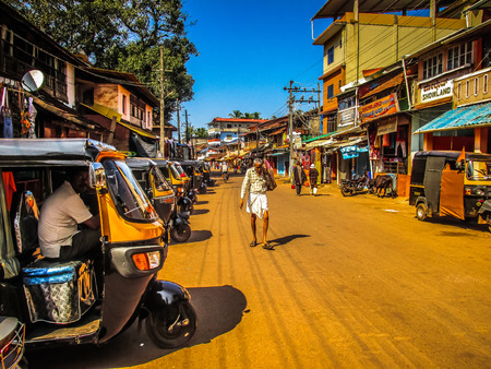 Unknown people walking on the street of Gokarna Karnataka India November 22, 2017 morningのeditorial素材
