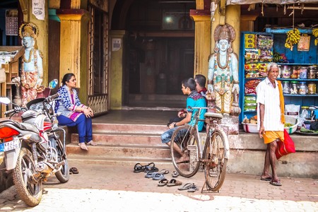 Unknown people walking on the street of Gokarna Karnataka India November 22, 2017 morningのeditorial素材