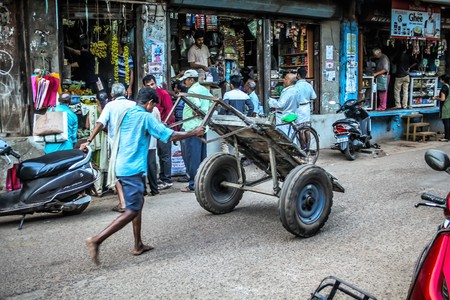 Unknown people walking on the street of Gokarna Karnataka India November 22, 2017 morningのeditorial素材