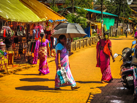 Unknown people walking on the street of Gokarna Karnataka India November 22, 2017 morningのeditorial素材
