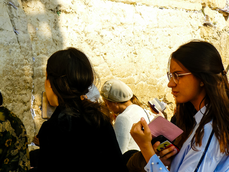 Jerusalem Israel April 16, 2018 Unknown woman praying front the Western Wall at the old city of Jerusalem on afternoonのeditorial素材